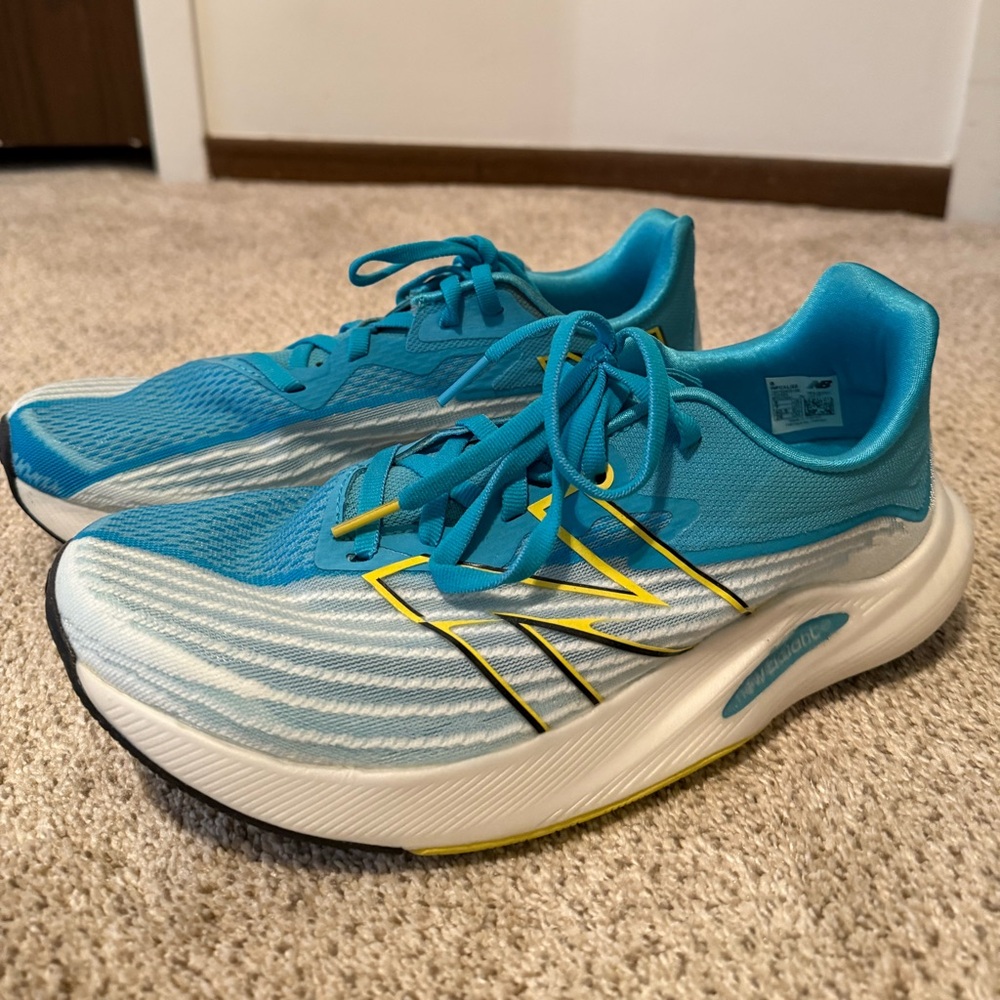 New balance fuel cell rebel v2 speed running shoe size 9.  Only worn twice
